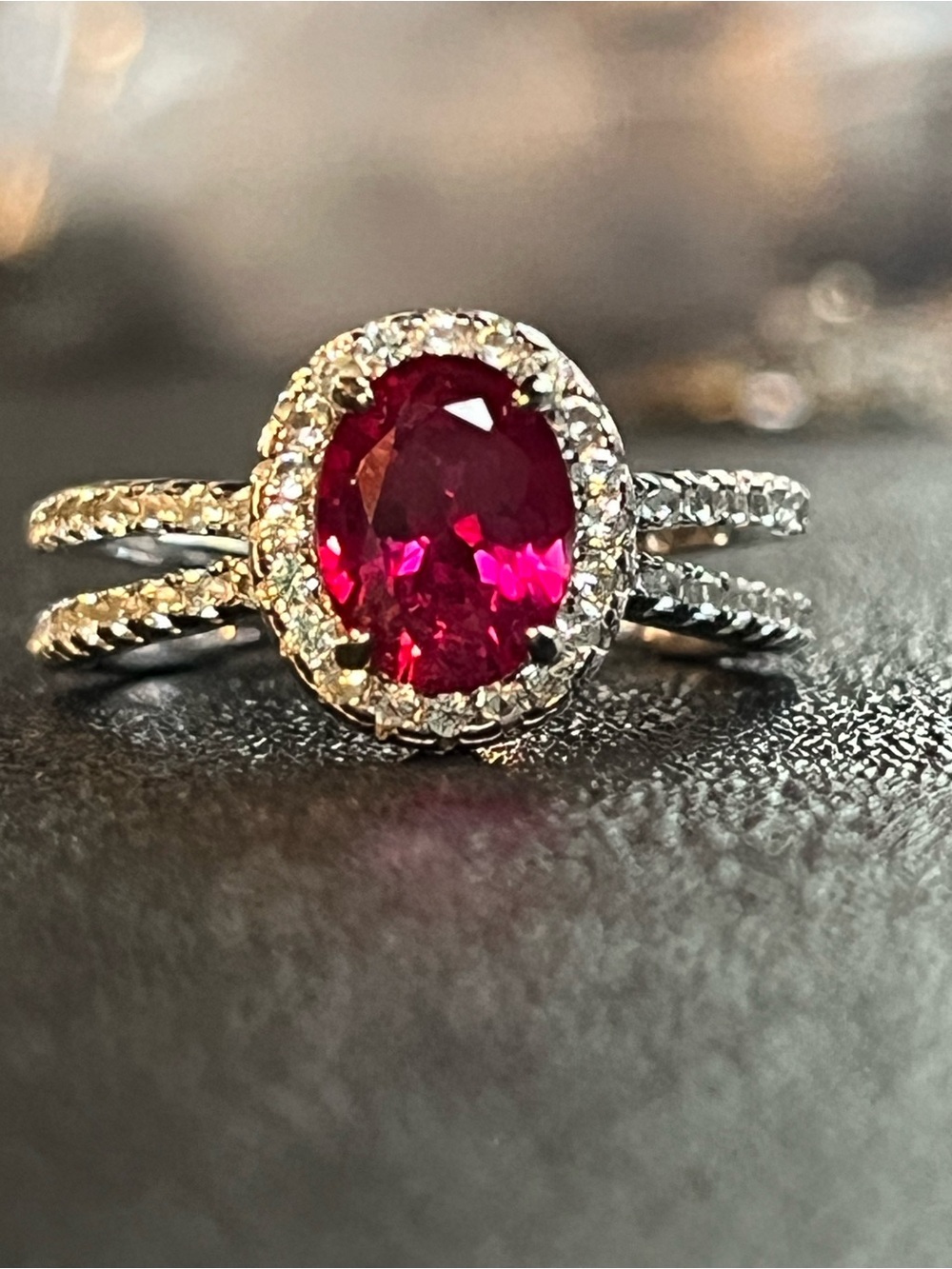 Sterling silver double row ring with pink oval gemstone center and cz accents. 6